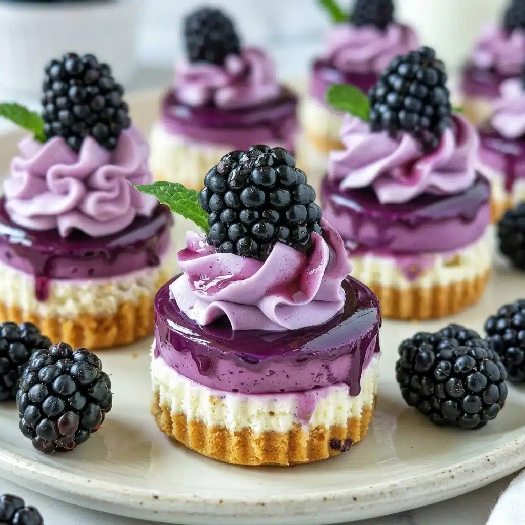 Delightful Mini Blackberry Cheesecakes with Whipped Cream